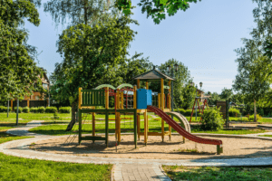 Well maintained playground showcases how revitalize your HOA enhances parks and playgrounds.